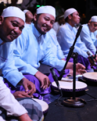 Musicians pose during an interlude in the music