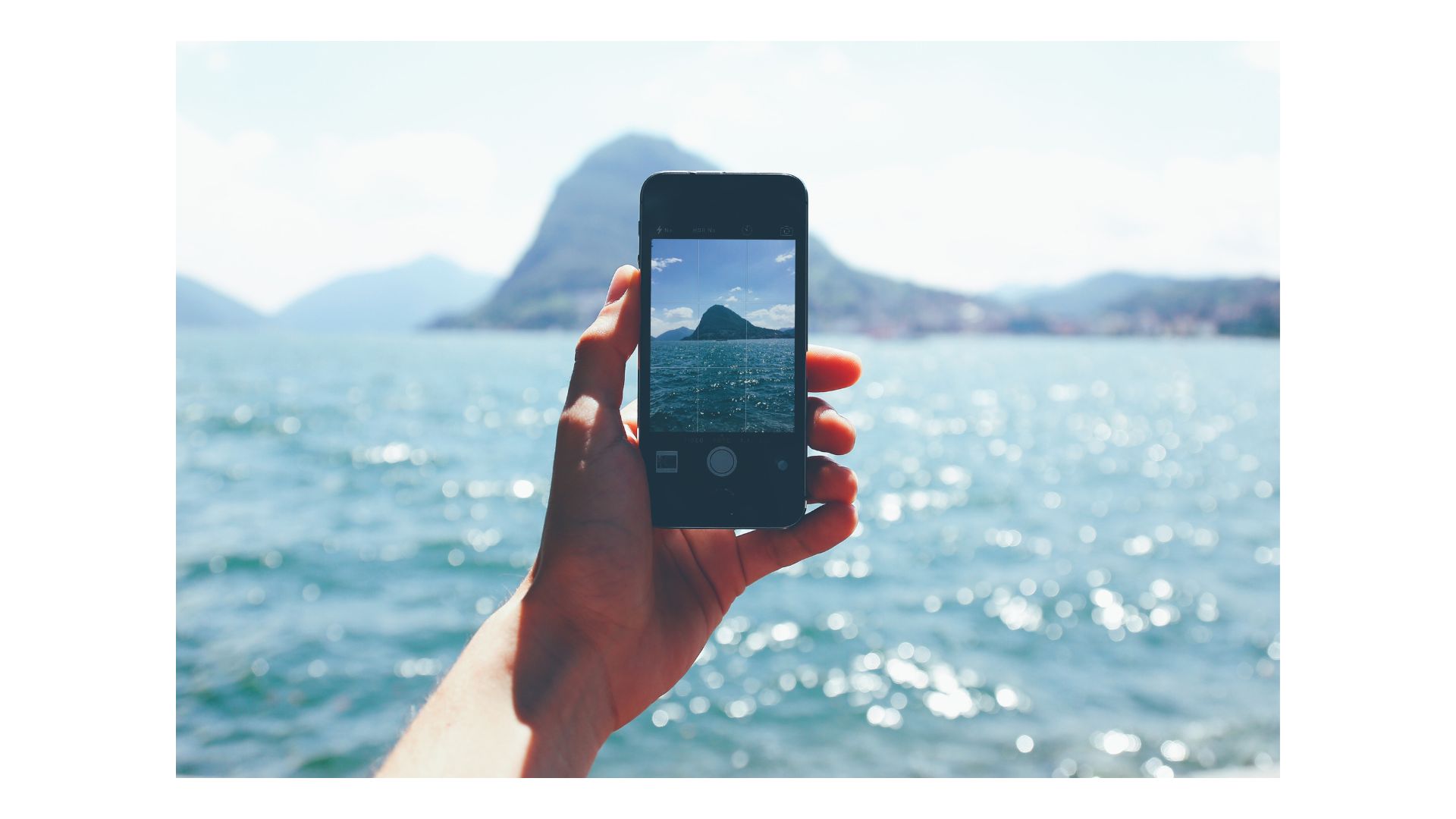 A person taking picture through their phone